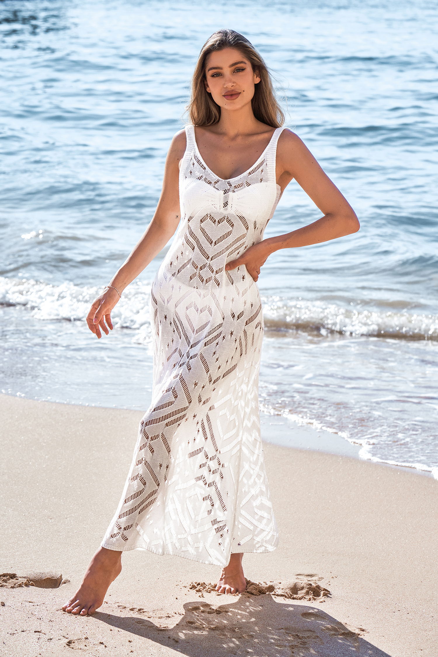 Abito copricostume senza maniche bianco con scollo a V