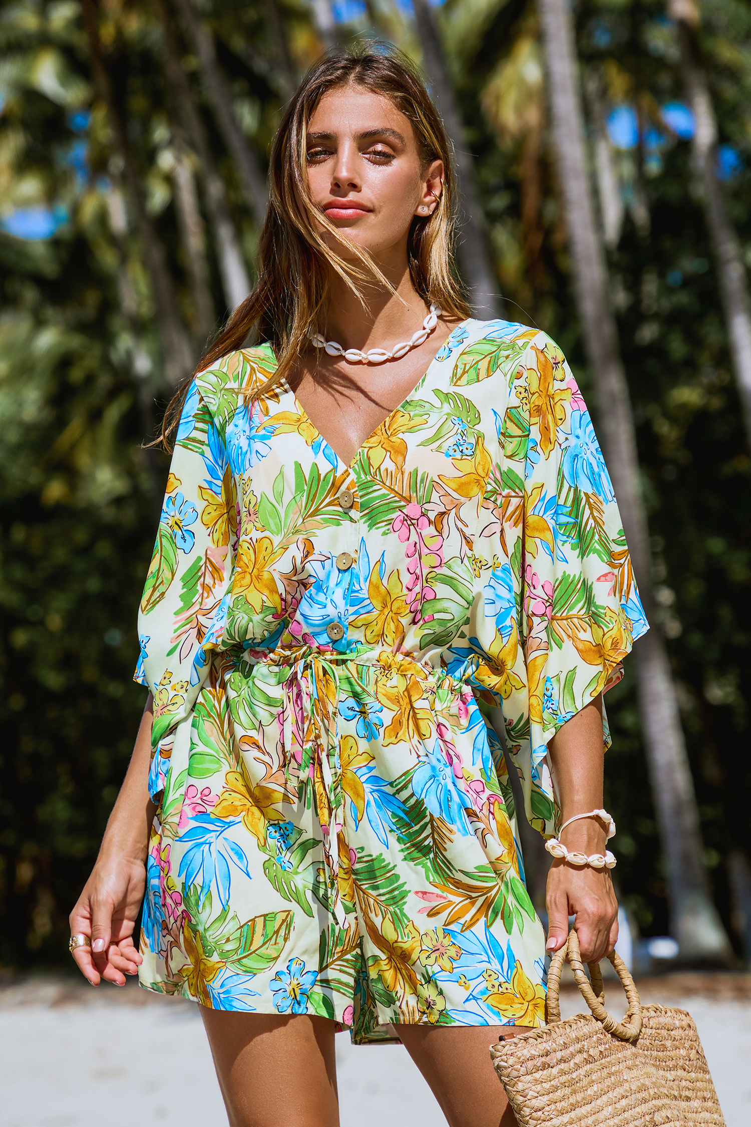 Mono holgado con mangas dolman y estampado floral tropical
