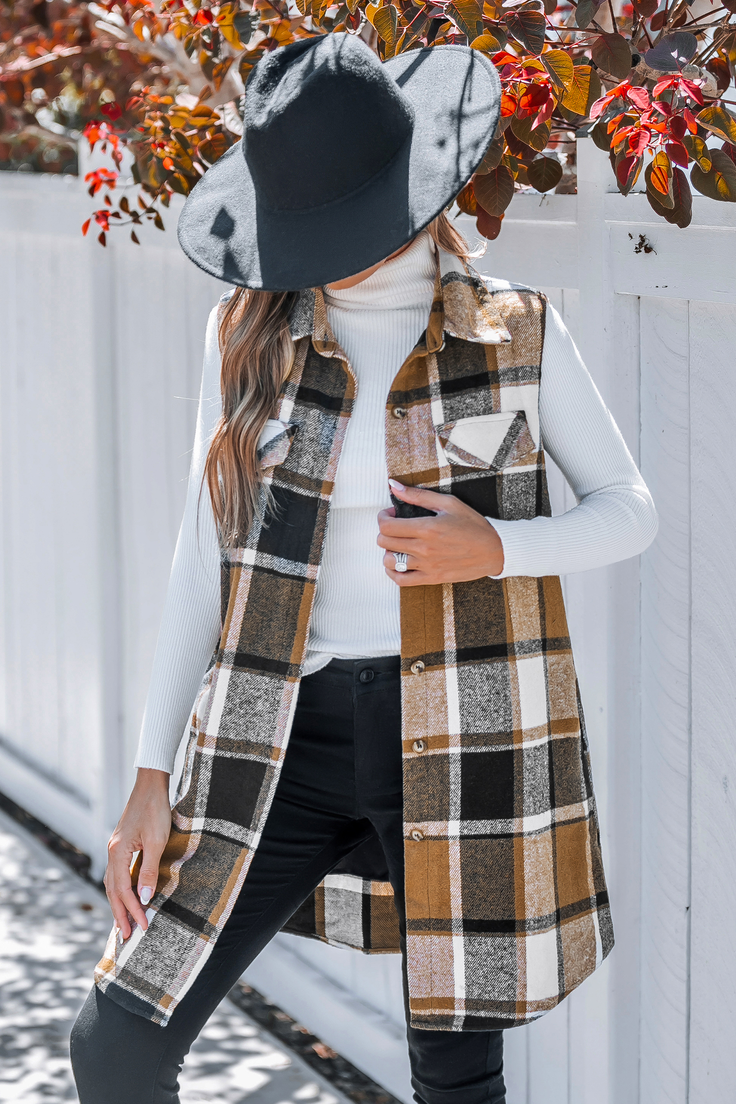 Gilet senza maniche con colletto a quadri e bottoni sul davanti