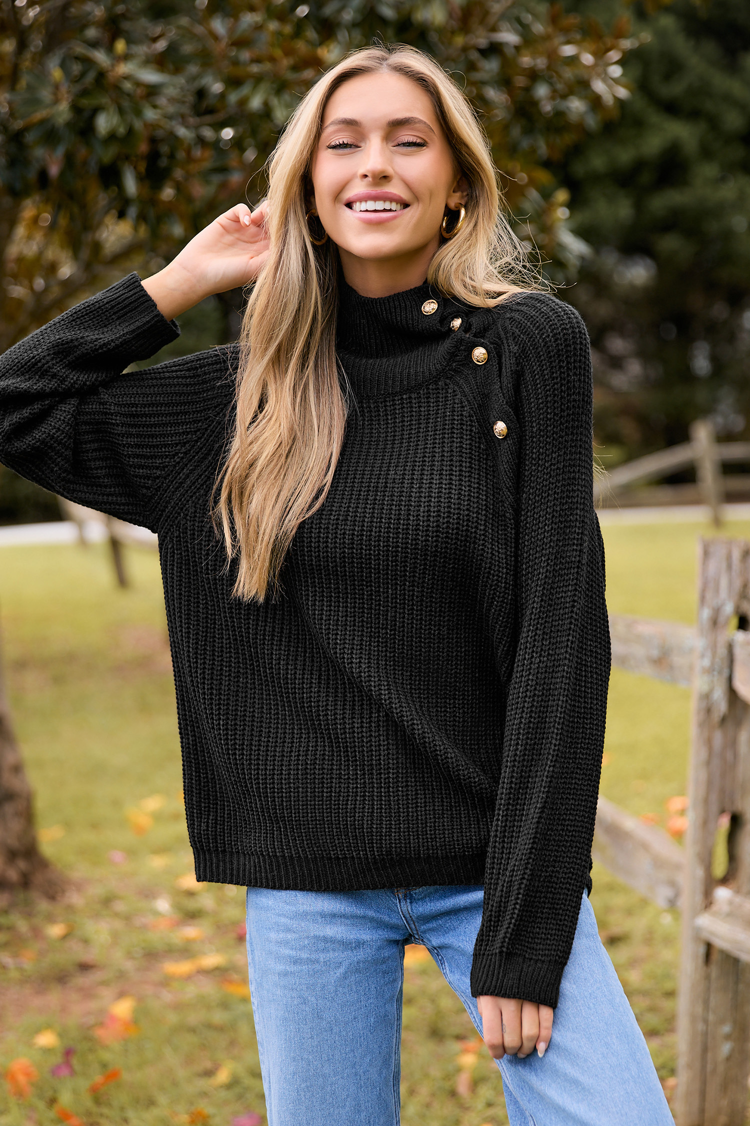 Blusa de cuello alto y manga larga de punto negro