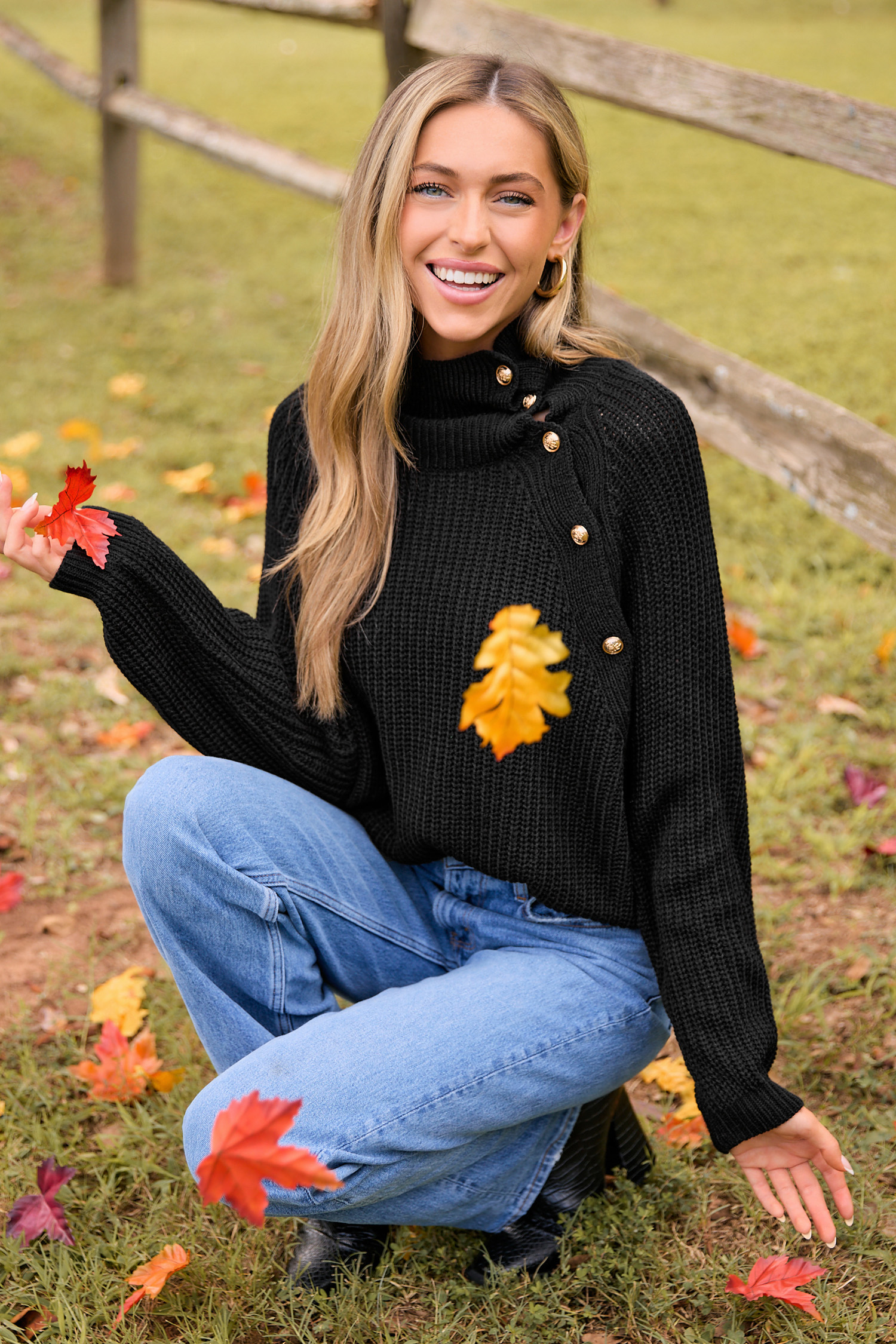 Blusa de cuello alto y manga larga de punto negro