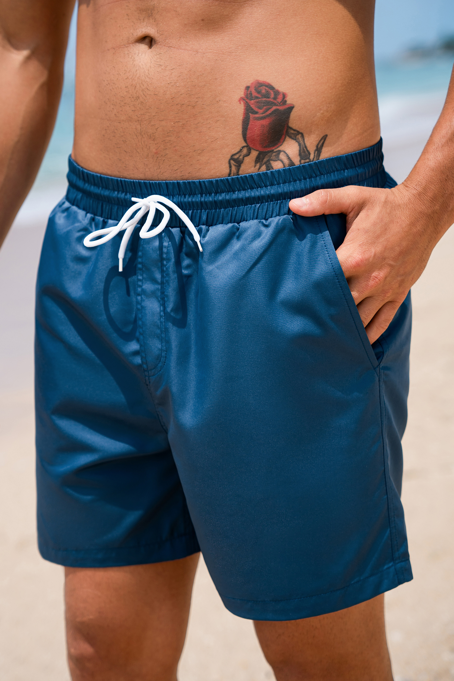 Pantaloncini da spiaggia blu Indigo Coast