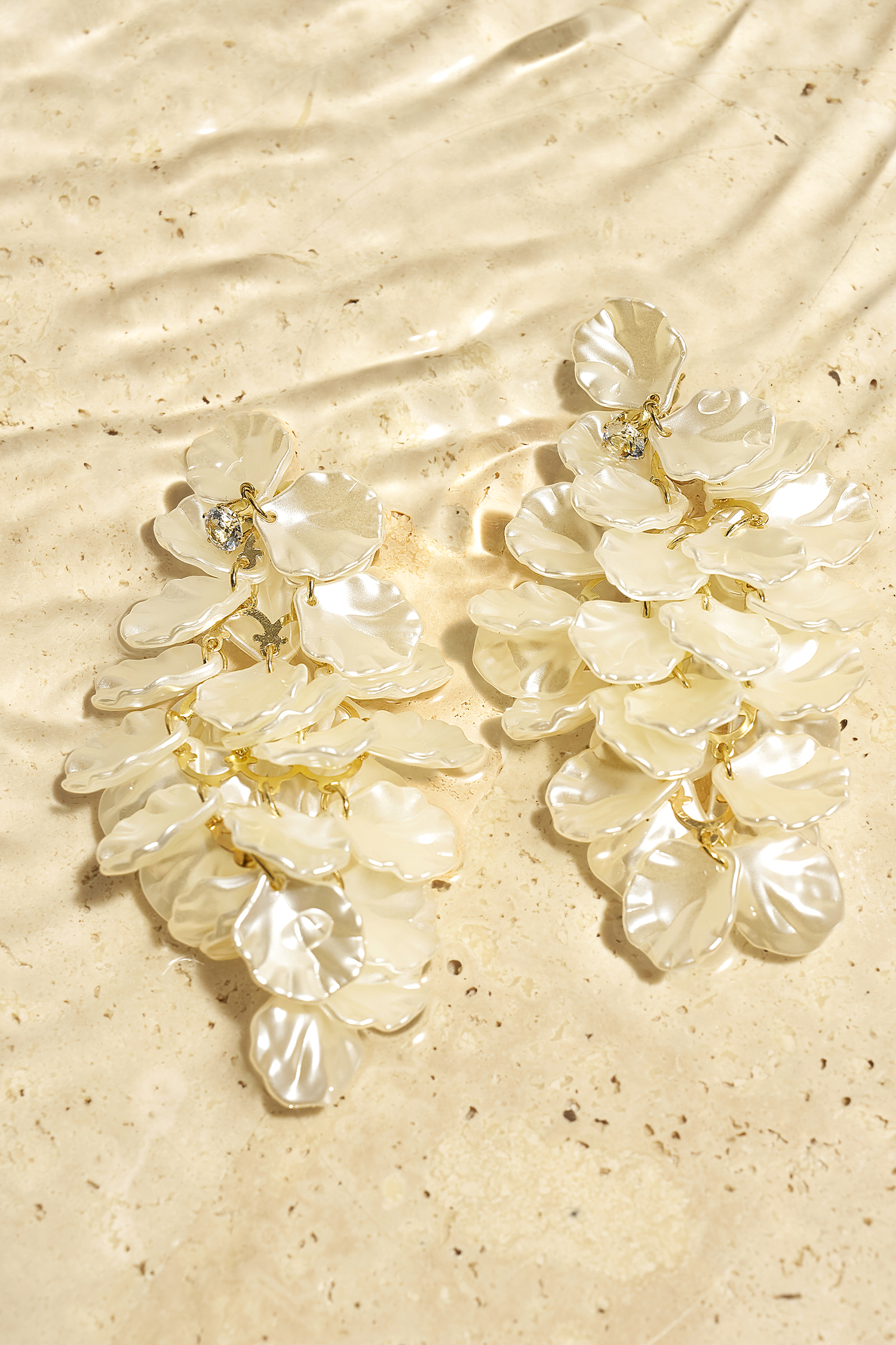 Pendientes de conchas marinas para la gala playera