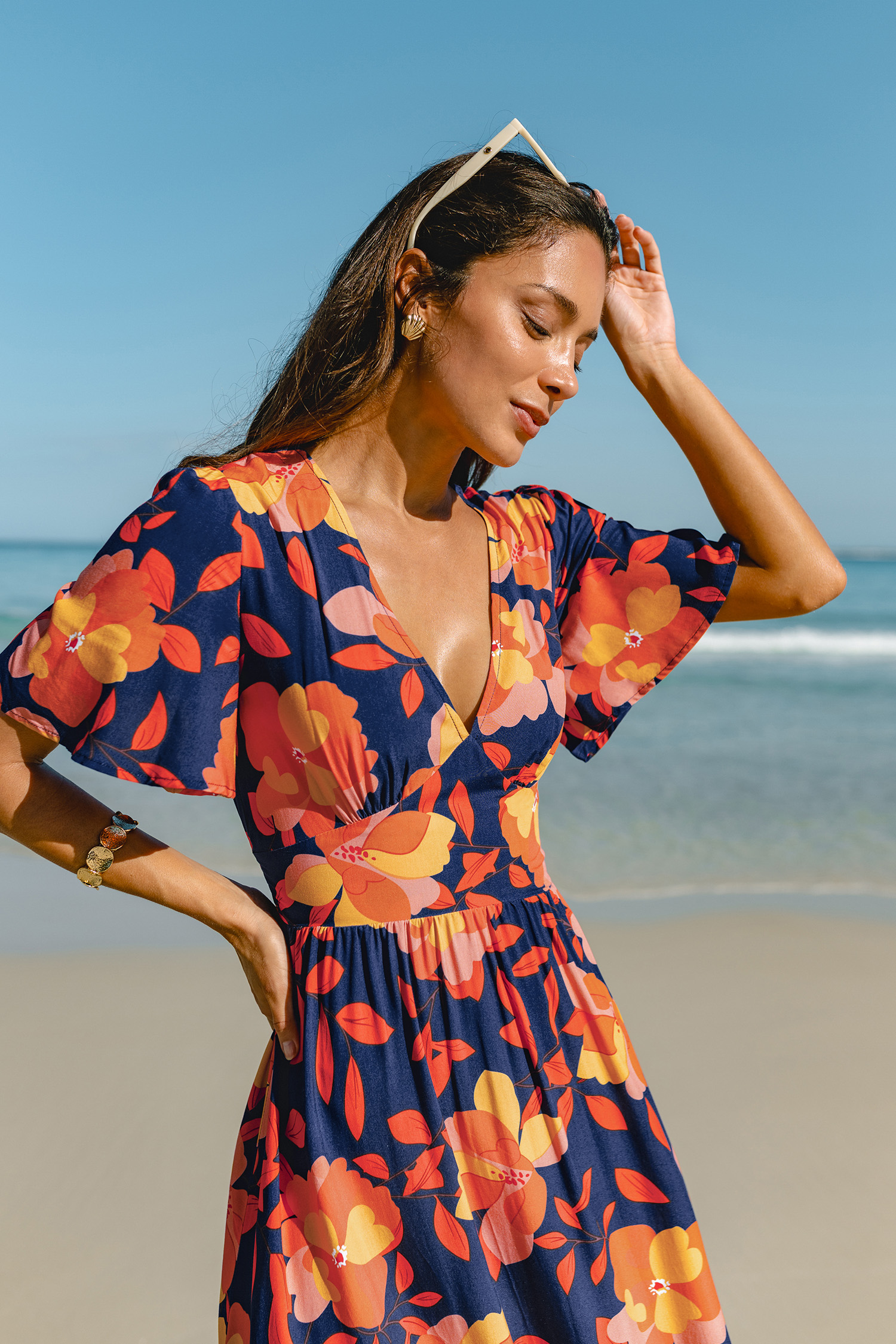 Maxi-jurk met bloemenprint en zonsondergangmotief