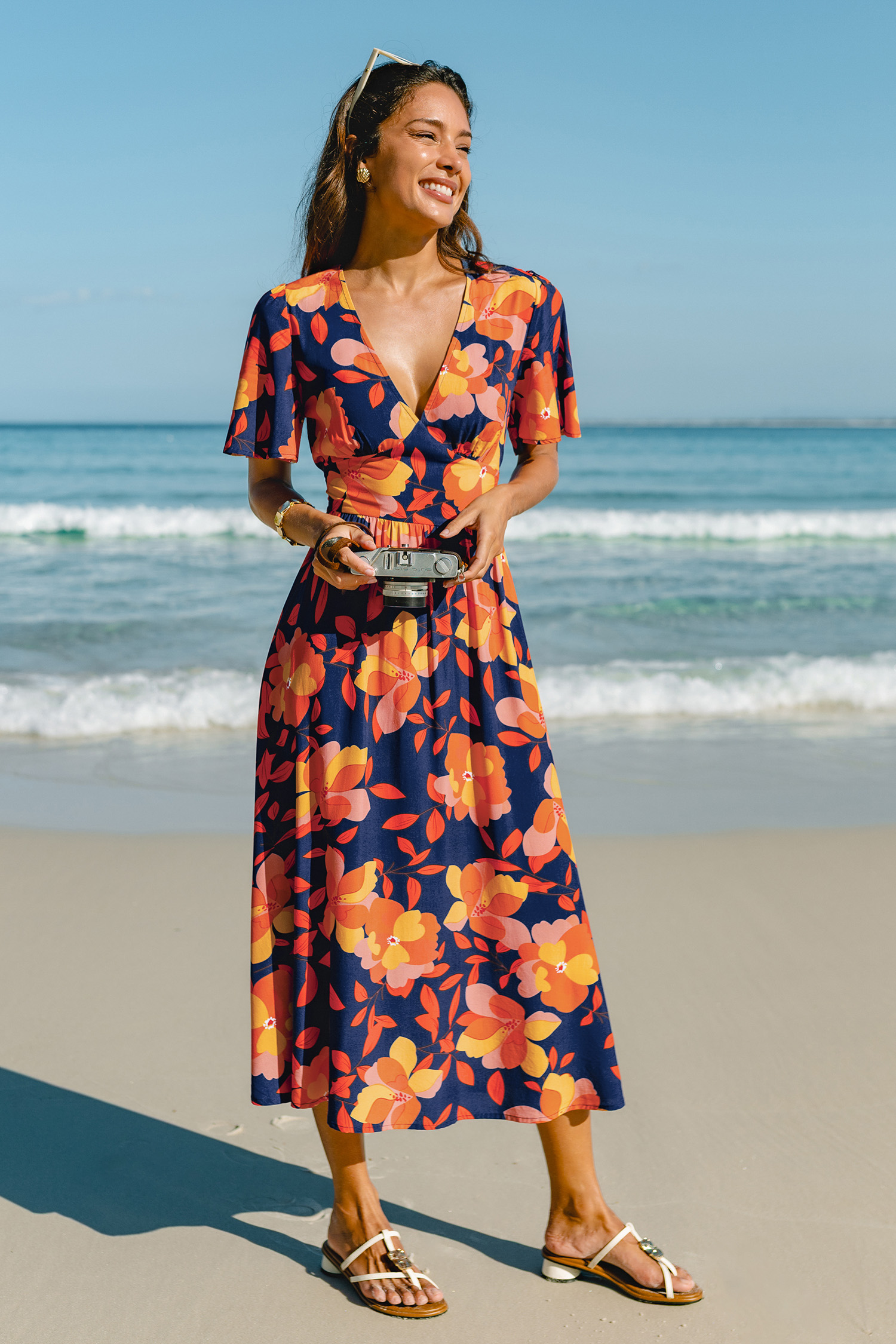 Maxi-jurk met bloemenprint en zonsondergangmotief