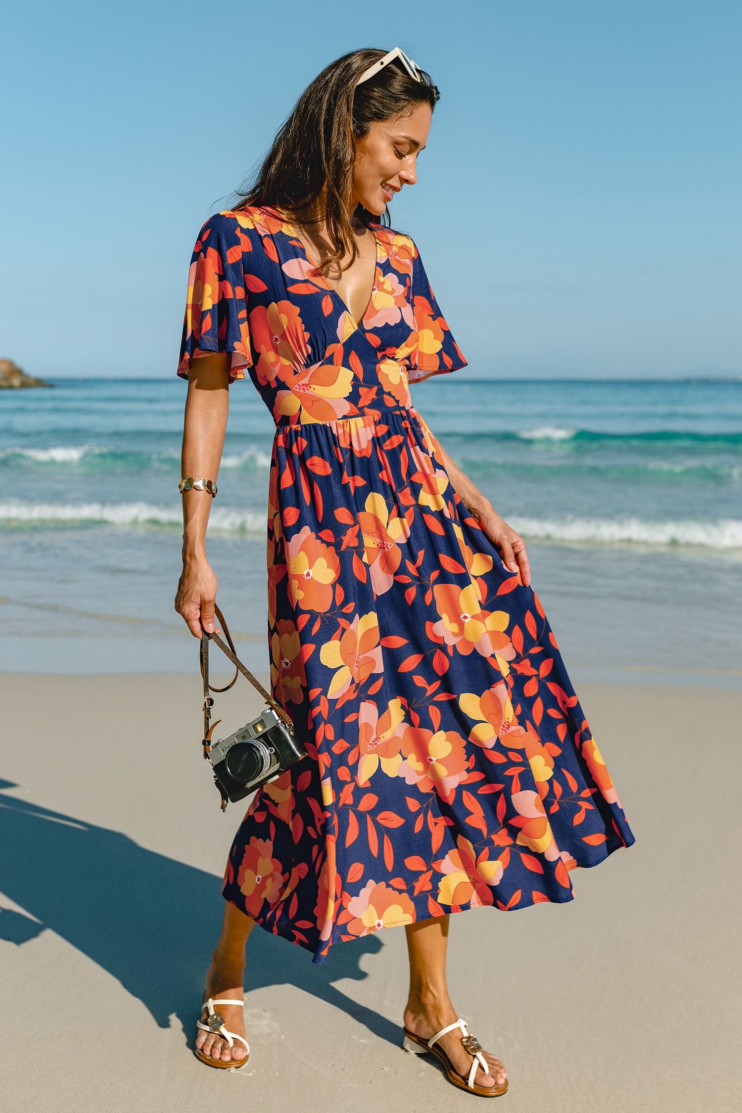 Maxi-jurk met bloemenprint en zonsondergangmotief
