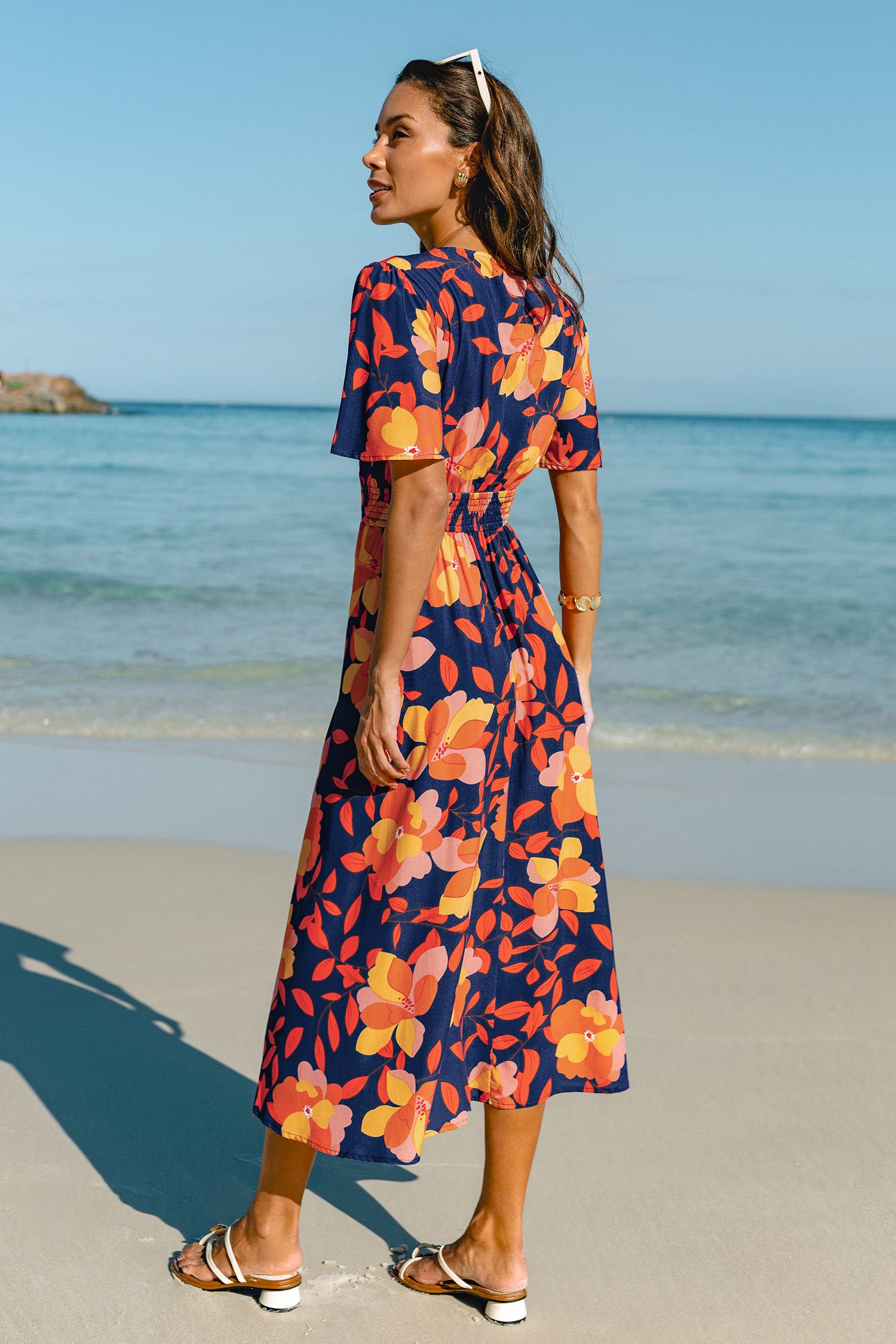 Maxi-jurk met bloemenprint en zonsondergangmotief
