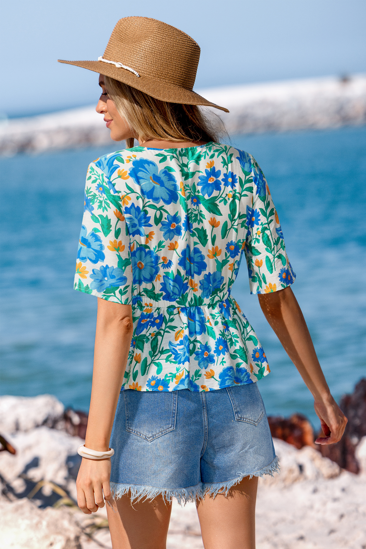 Top floral à col V et péplum