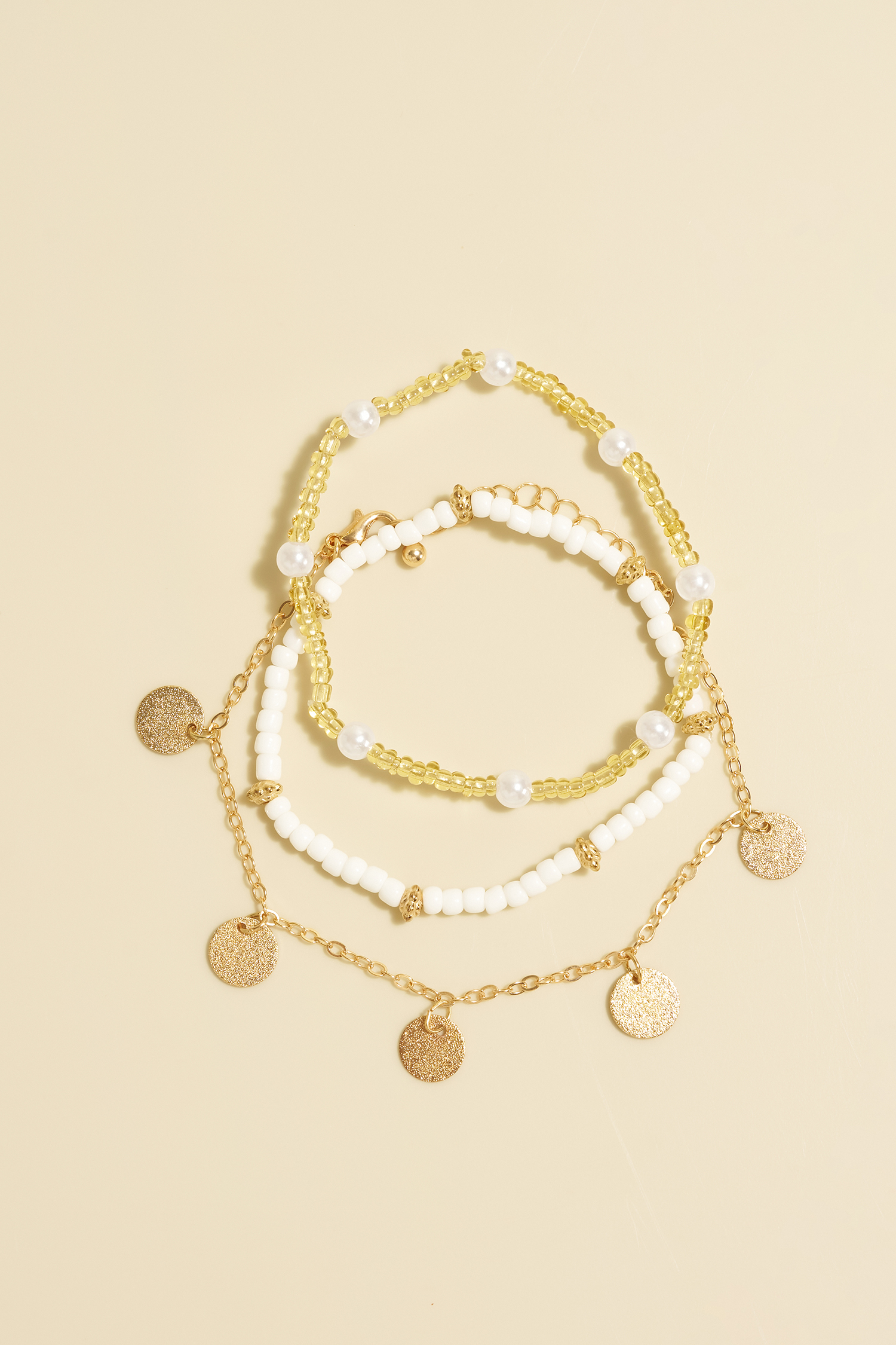 Set di cavigliere color oro 