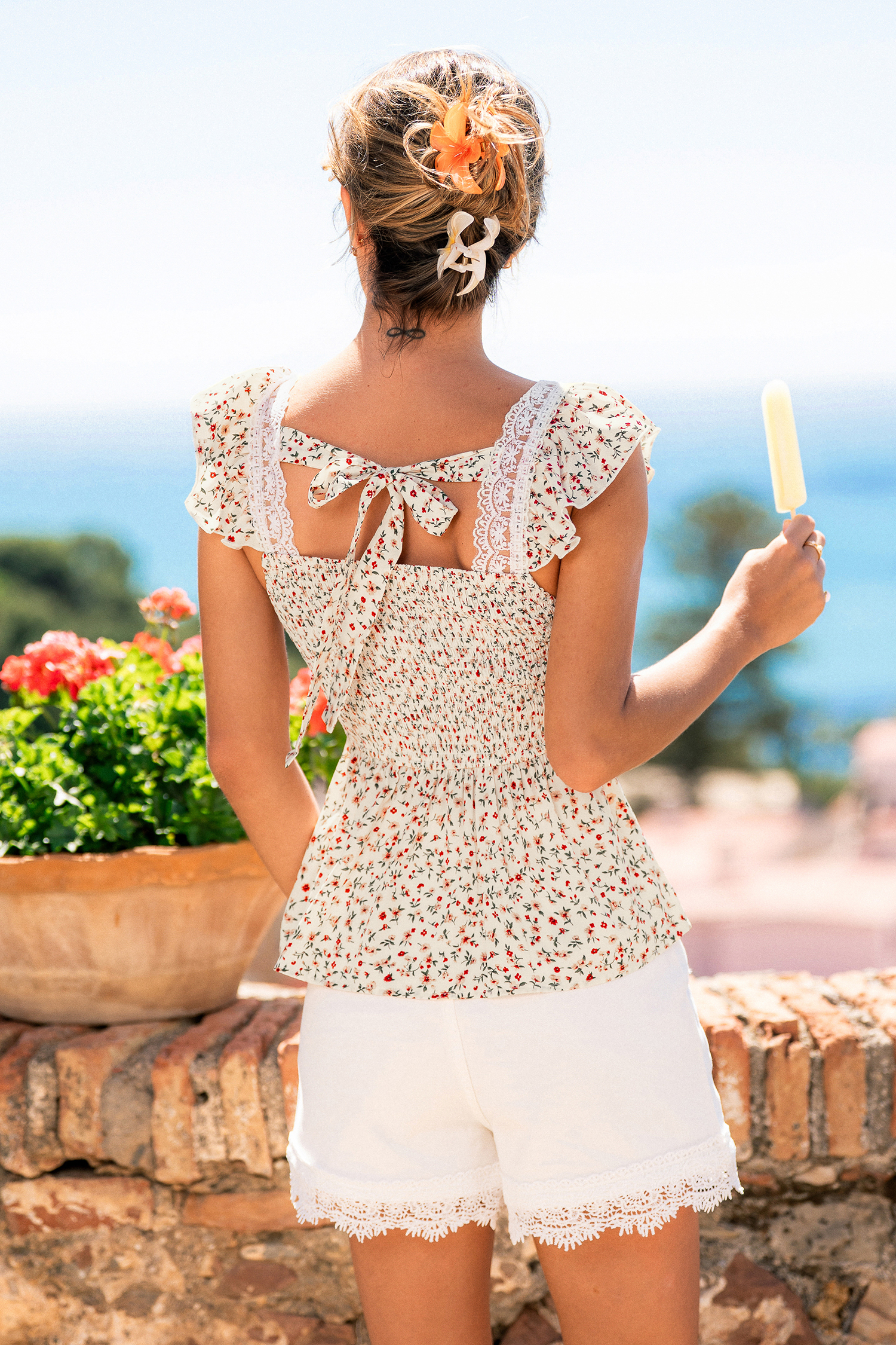 Top floreale unico