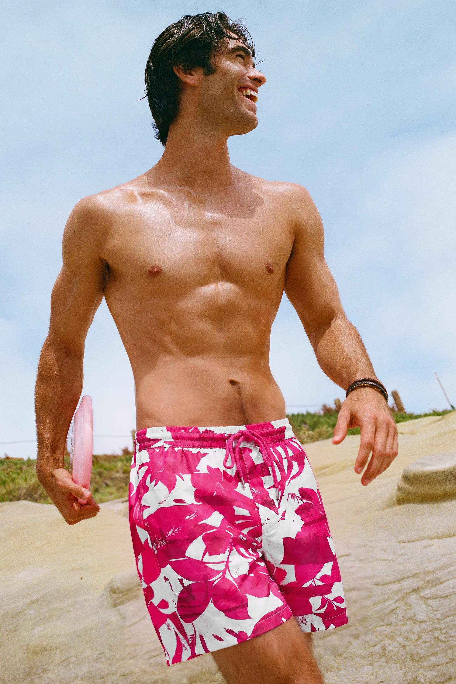 Pantalones cortos de baño tropicales rumbo al oeste