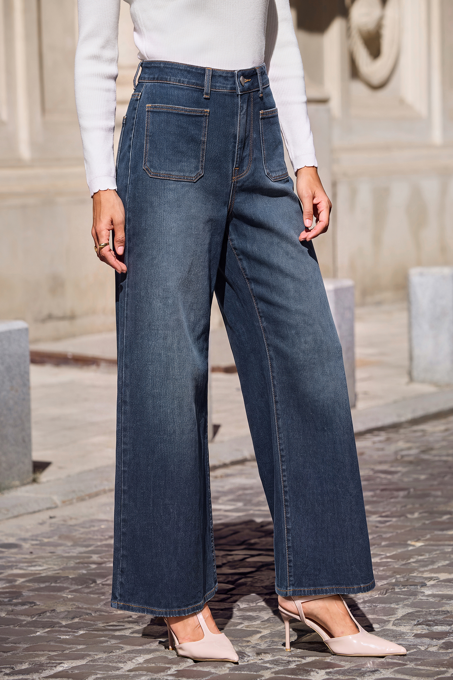 Jean bleu taille ultra haute à poches plaquées