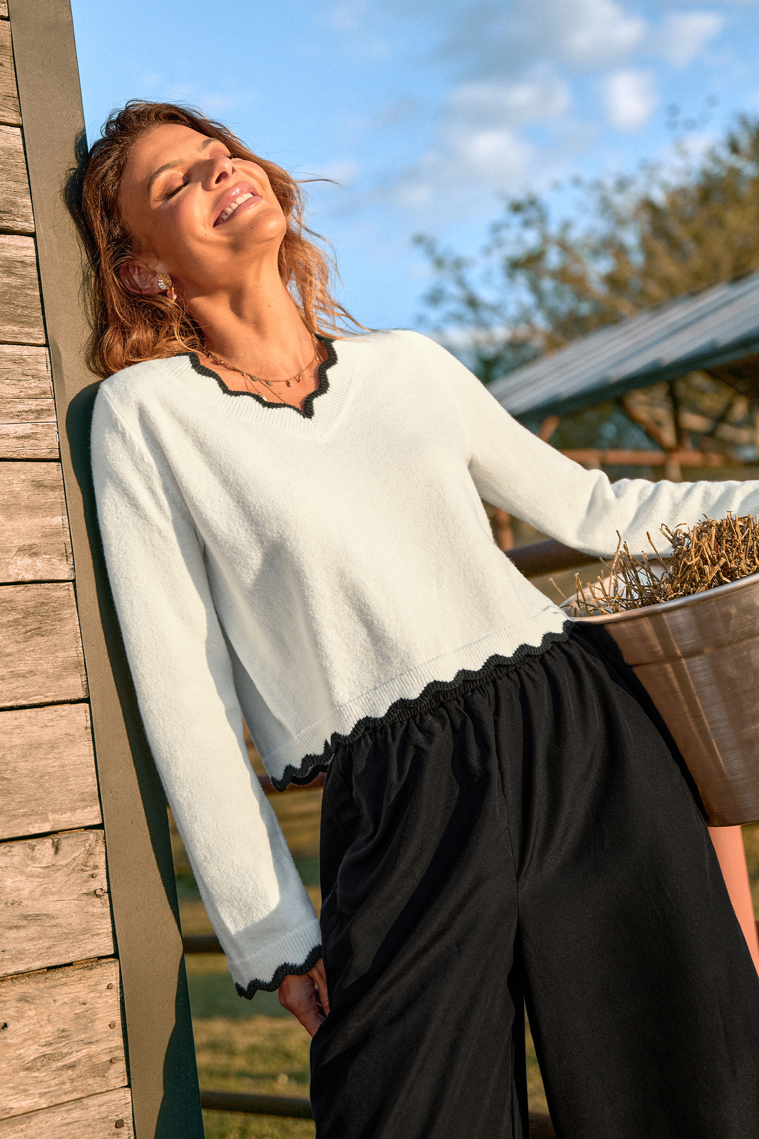 Rimanere in maglione bianco