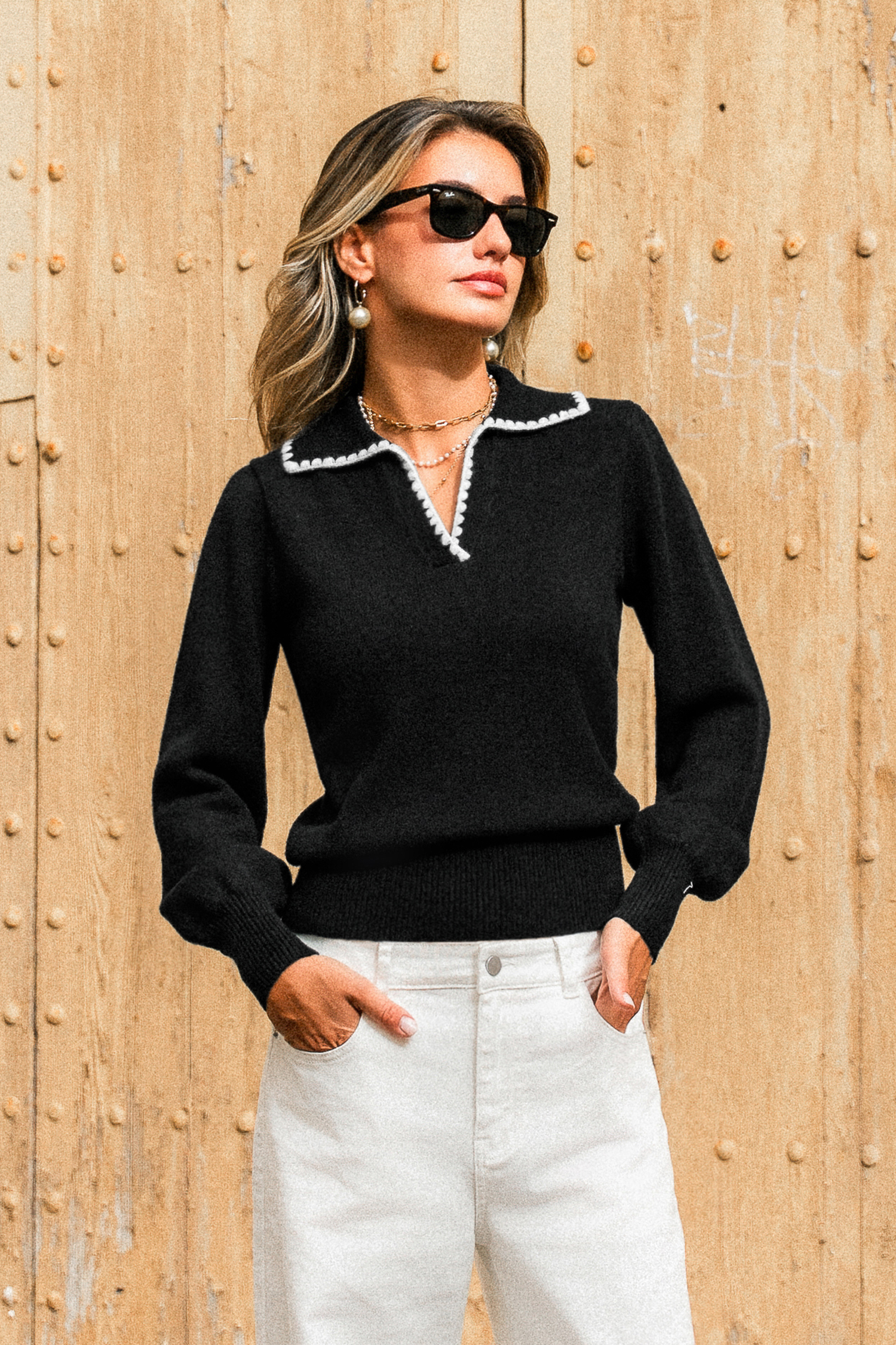 Pull noir en tricot à col chemise et manches longues