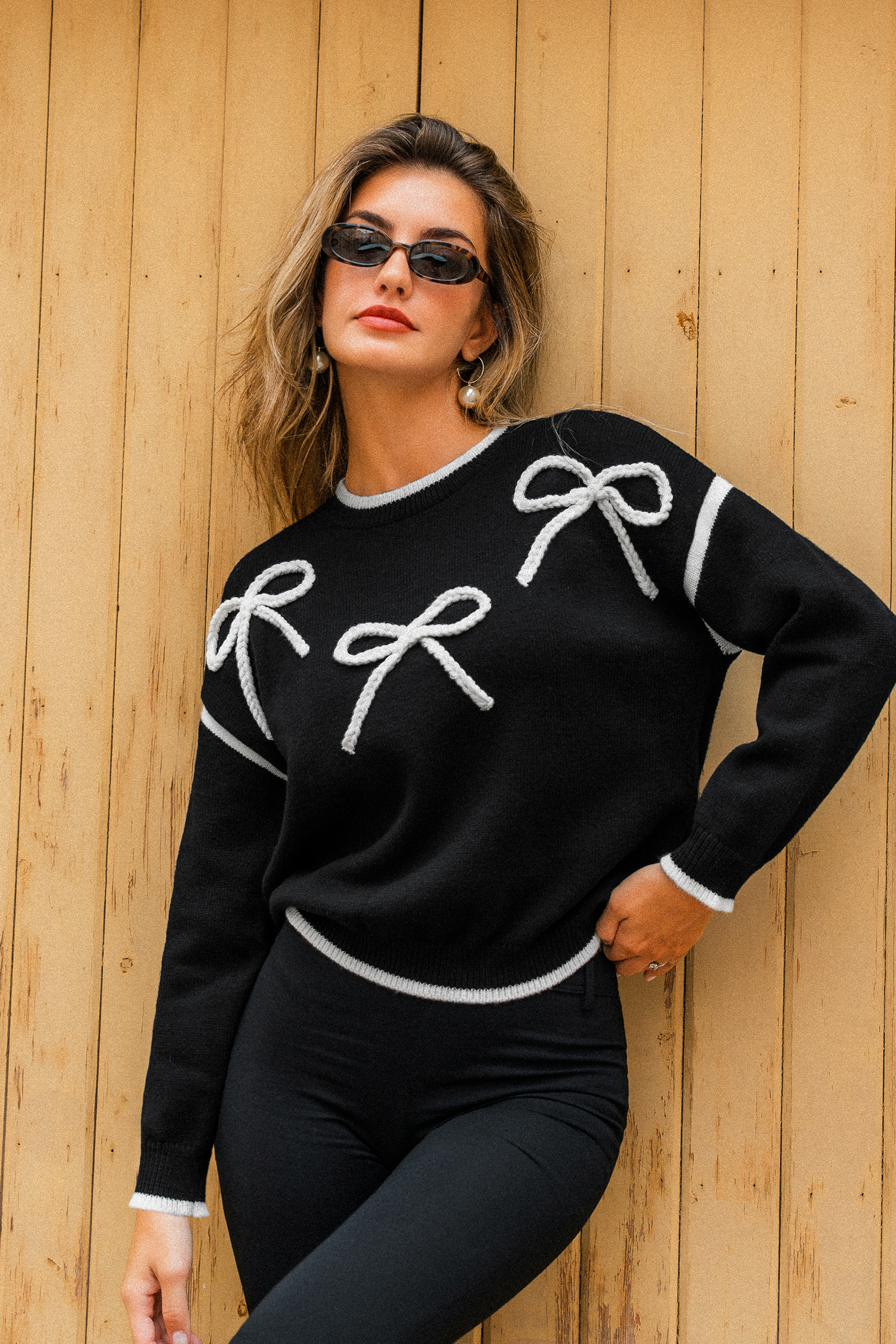 Schwarzer Langarmpullover mit Schleifendetail