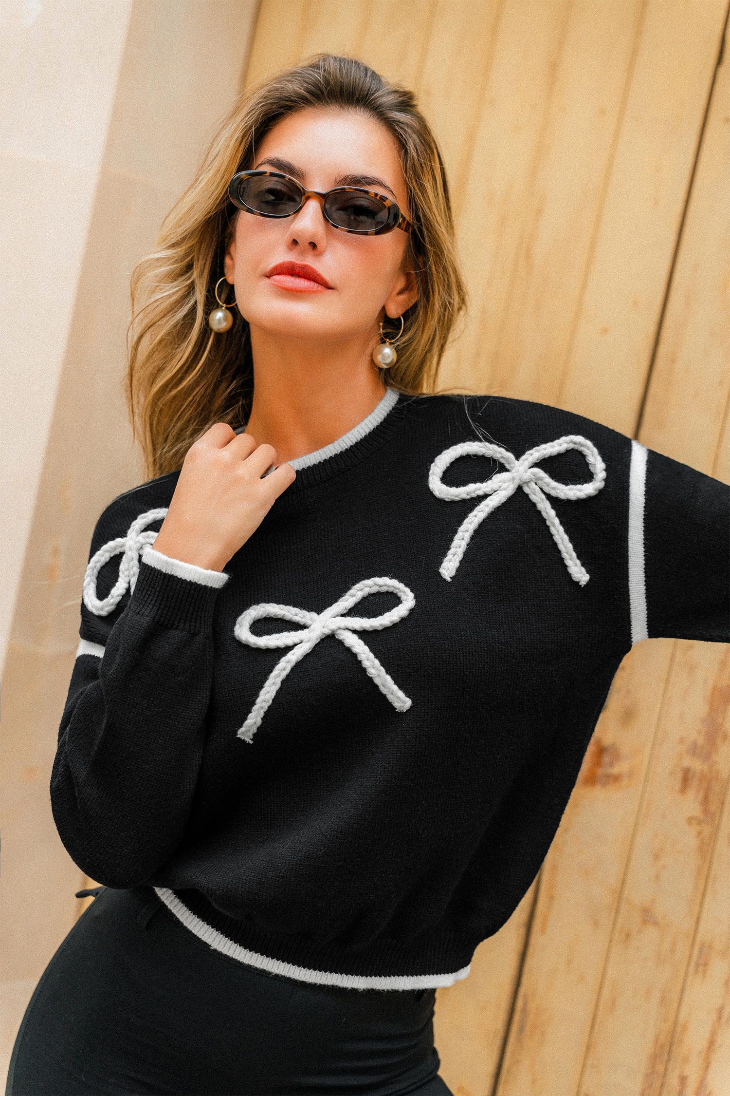 Schwarzer Langarmpullover mit Schleifendetail