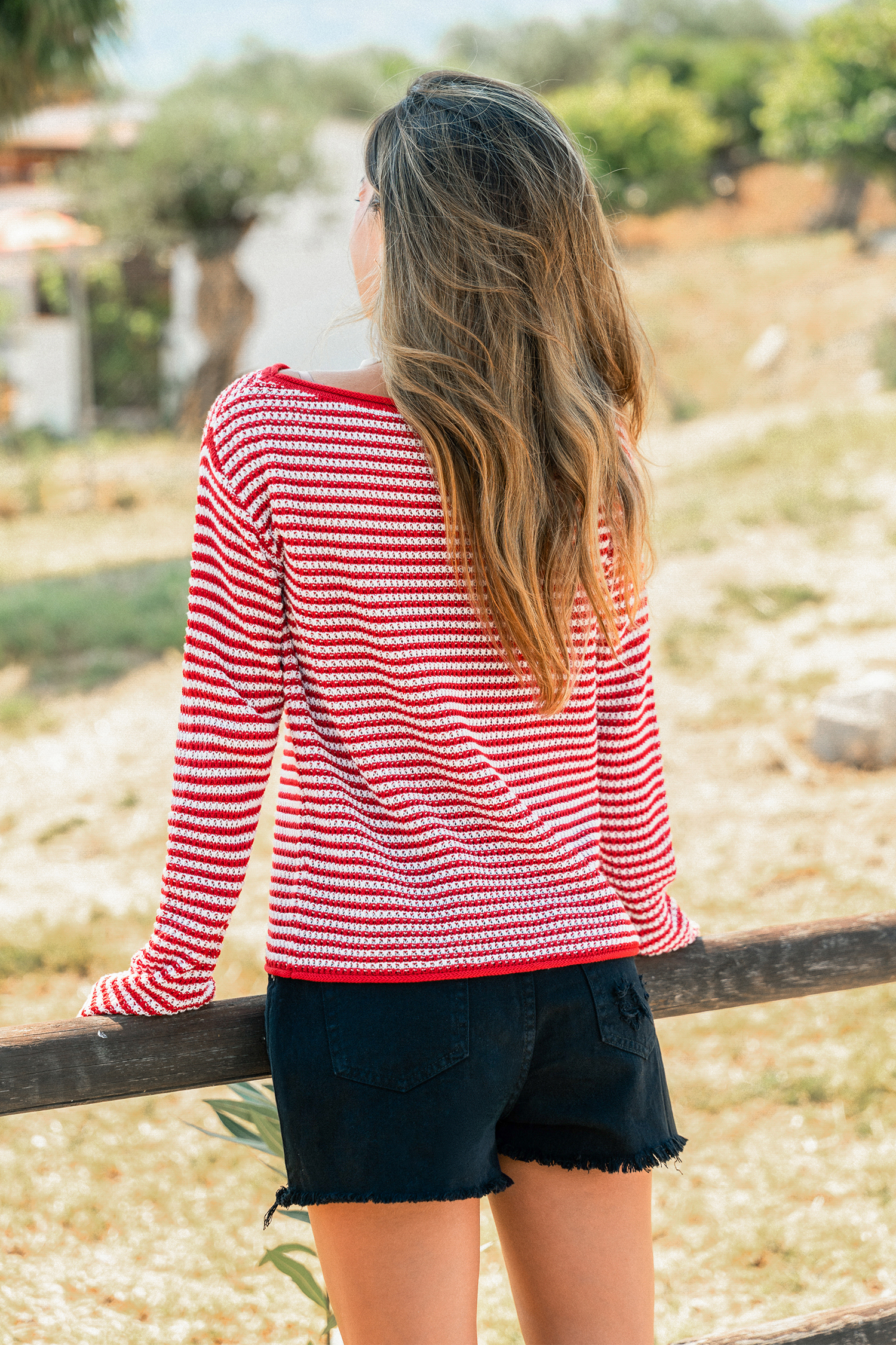 Left on Red Striped Sweater