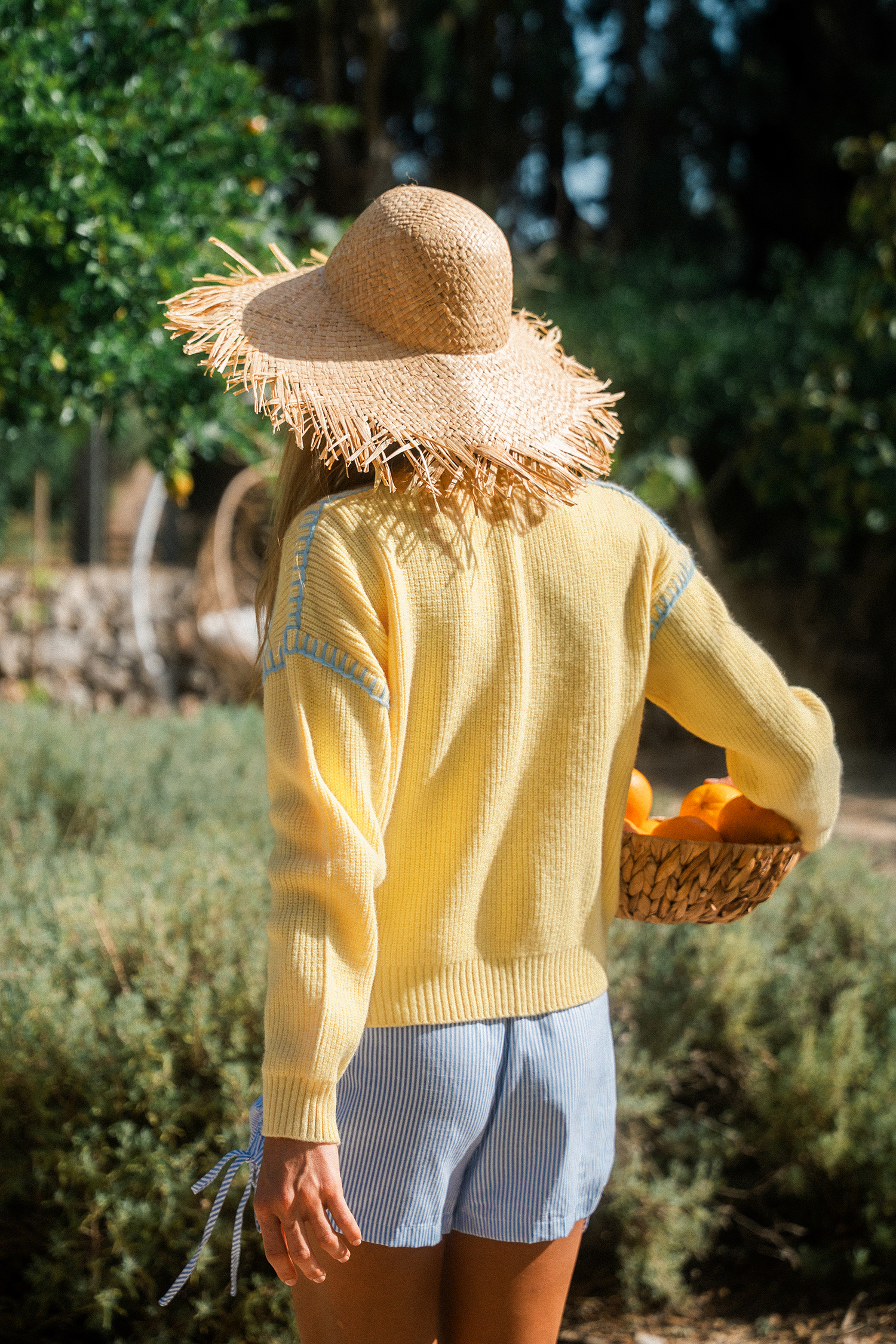 Maglione giallo campo di girasoli
