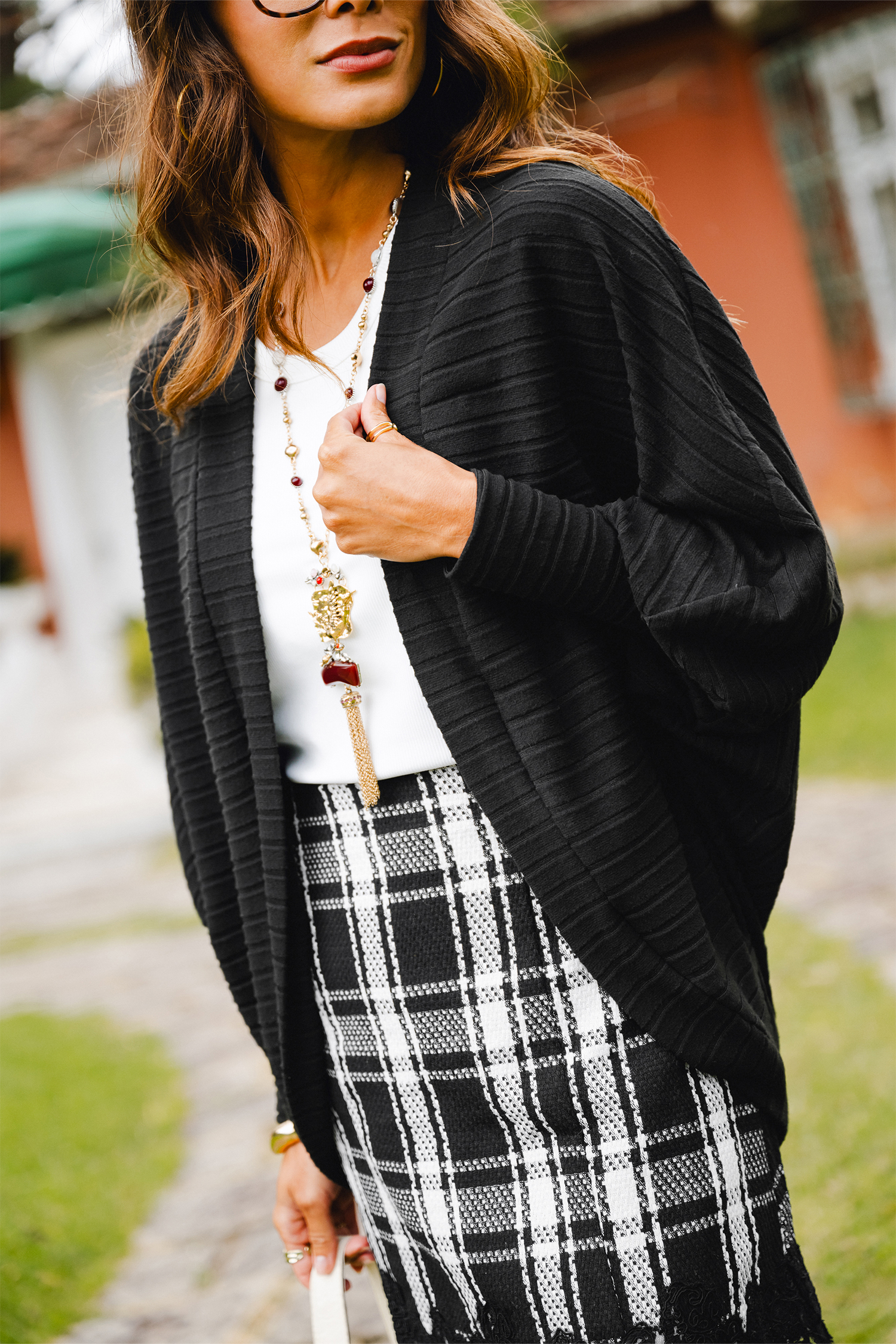 Cardigan noir en tricot à devant ouvert et manches longues